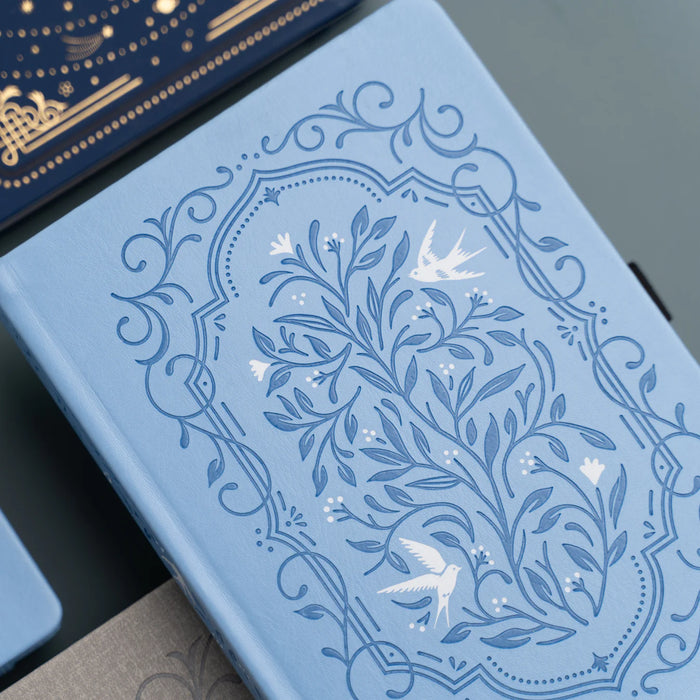 Songbird in Blue Notebook